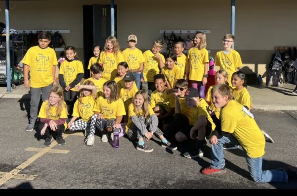 group of Vichy students in their yellow jog-a-thon t-shirts